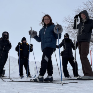 a group of five yo0ng skiers
